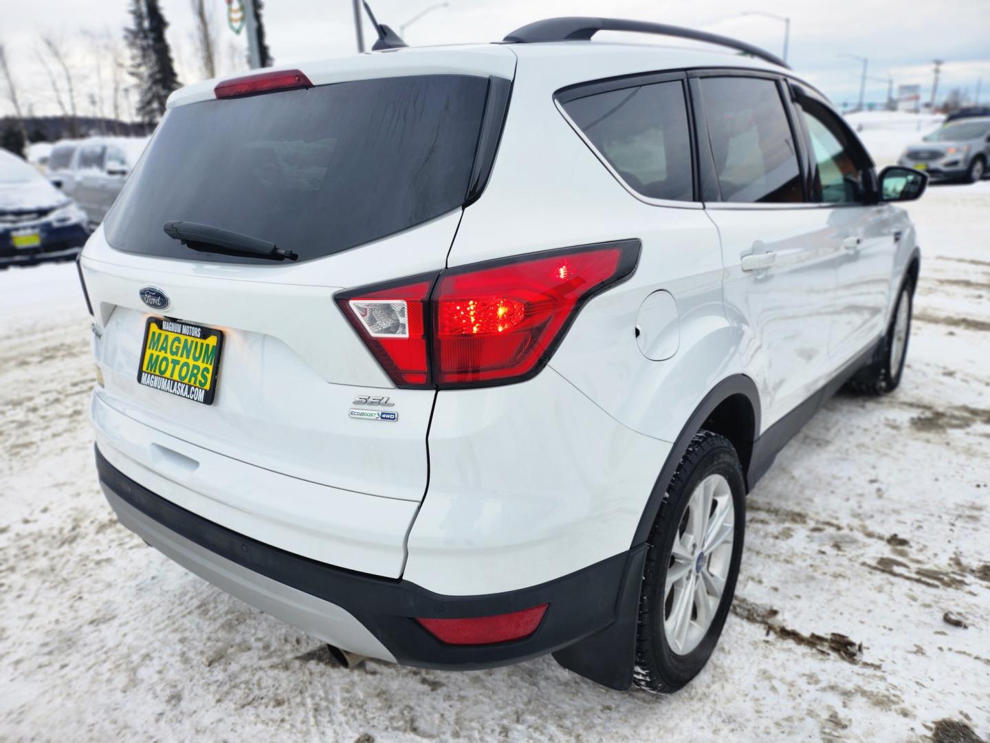 2019 White /BLACK Ford Escape SEL 4WD (1FMCU9HDXKU) with an 1.5L L4 DOHC 16V engine, 6A transmission, located at 1960 Industrial Drive, Wasilla, 99654, (907) 274-2277, 61.573475, -149.400146 - Photo#6